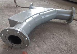 90°雙金屬復(fù)合耐磨帶背包彎頭φ180有什么特點？